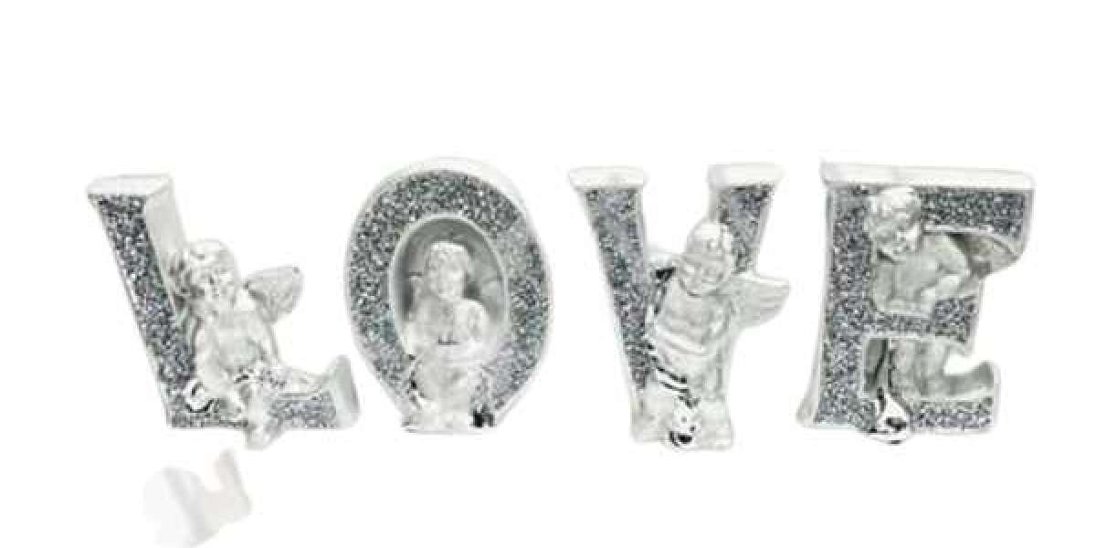 Unveiling the Sparkling Gem the Crushed Diamond Love Cherub Figurine from King Bling